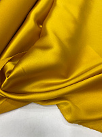 Шёлк атласный жёлтого цвета с эластаном.