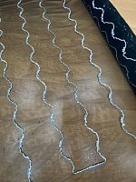 Ткань чёрная сетка вышитая рисунком из серебрянных паеток